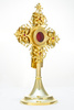 A magnificent brass reliquary in the form of a small monstrance decorated with rubies, 33 cm high