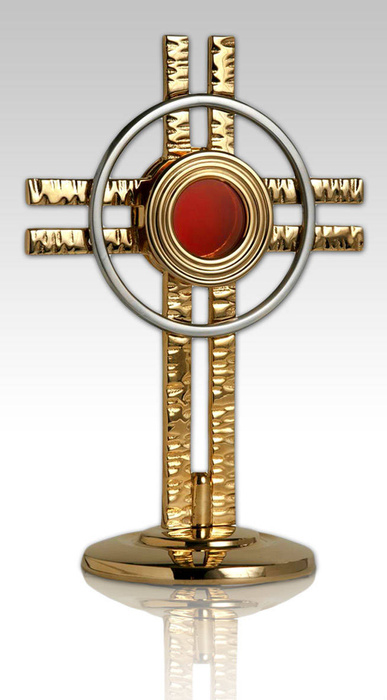 Gilded brass reliquary in the shape of a cross for one relic with a height of 20 cm