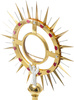 Large monstrance decorated with stones,brass, gold and silver plated elements with a height of 80 cm