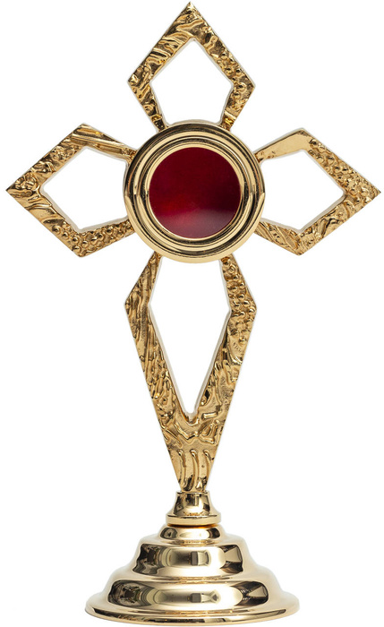 Brass reliquary in the shape of a cross gilded for one relic with a height of 19 cm