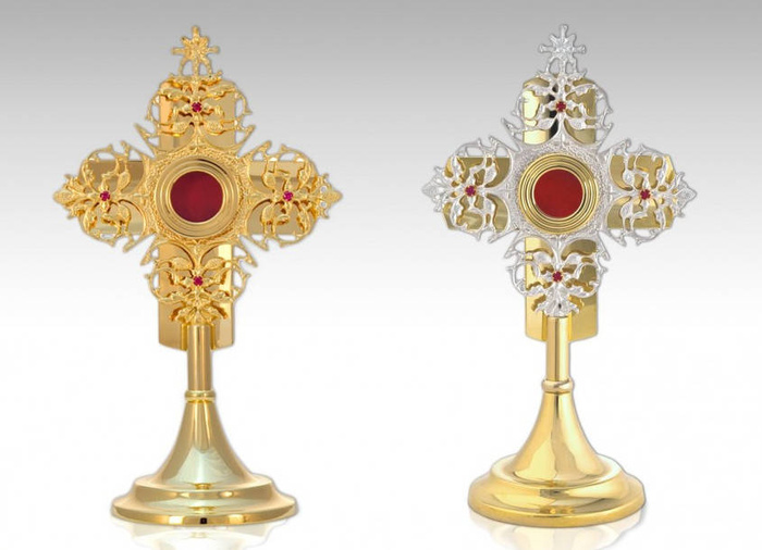 A magnificent brass reliquary in the form of a small monstrance decorated with rubies, 33 cm high
